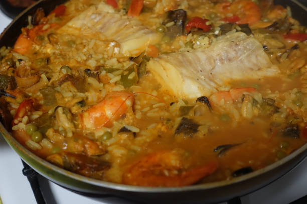istock Fish and seafood stew during cooking 1301030599