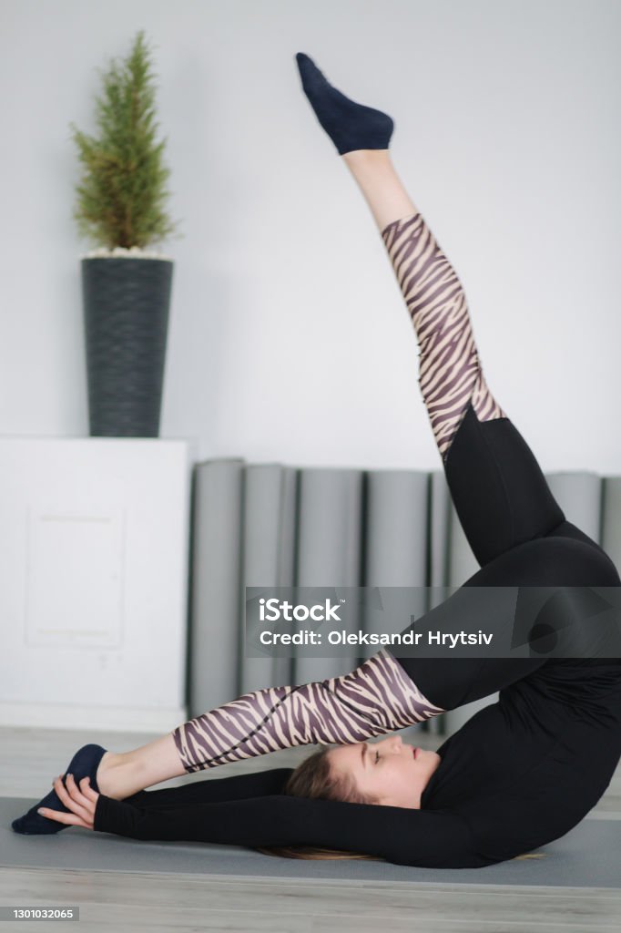 Young Stretching Master Show Differnt Poses For Stretch Stock Photo Download Image Now iStock