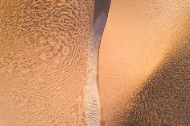 Desert sand dune ridge from above aerial perspective