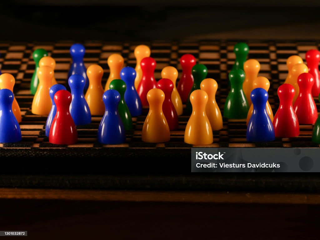 Colorful Figures For Ludo Family Board Game Isolated Stock Photo