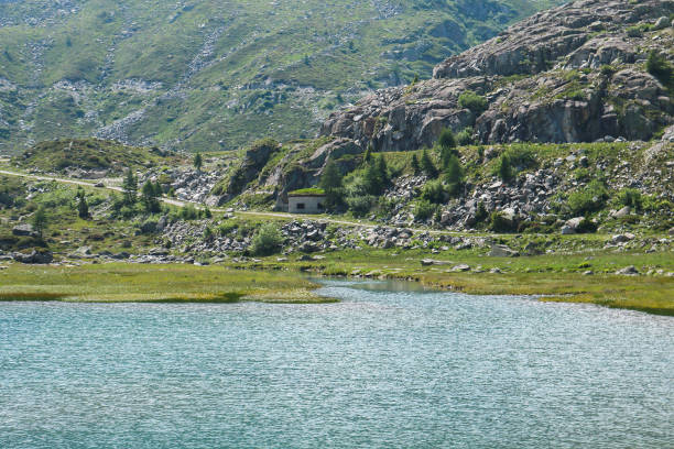 istock Beautiful panorama of cornisello mountains and lakes 1301034320