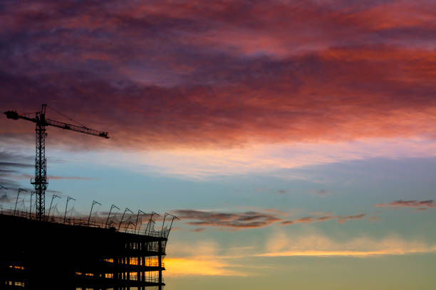 istock Backlight of a building and a crane 1301035821