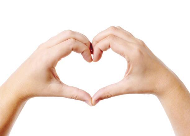 istock Feminine hands form a heart shape, symbolizing love and affection 1301037458