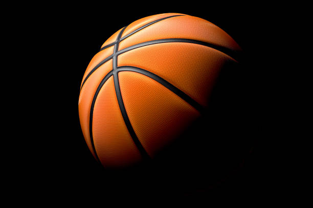 istock Basketball ball isolated on black background 1301038474
