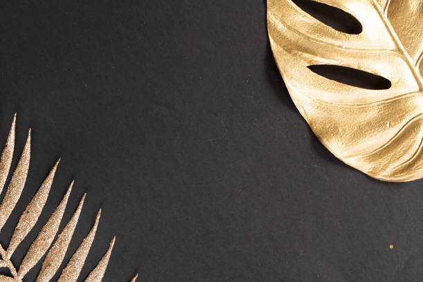 istock Golden tropial leaves 1301039326