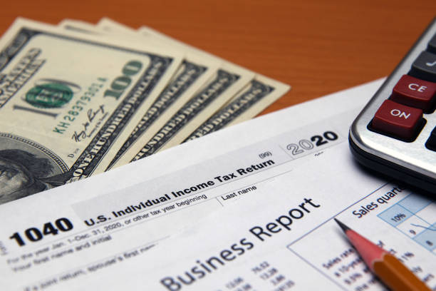 istock Tax form calculator planning audit finance 1301040361