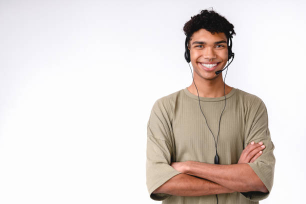 istock Confident young man in dispatcher`s headset isolated over white background 1301040527