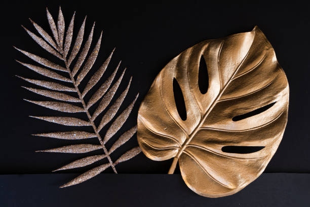 istock Golden tropial leaves 1301040703