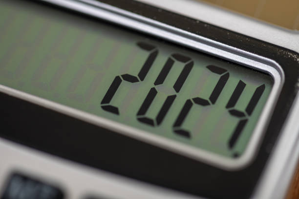 istock Close up of a calculator screen with year 2024 1301041979