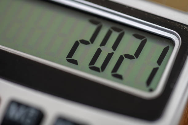 istock Close up of a calculator screen with year 2021 1301042167