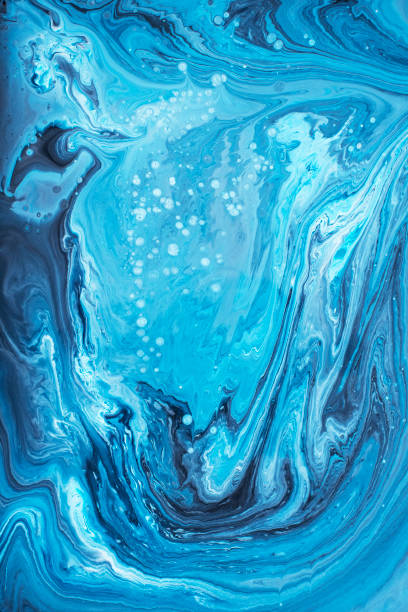 istock Free Flowing Blue and White Acrylic Paint 3 1301043203