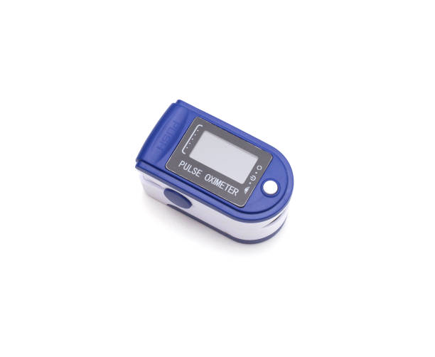 istock fingertip pulse oximeter, over white background. Medical device for measuring the pulse and oxygen saturation of the lungs, isolate 1301043812