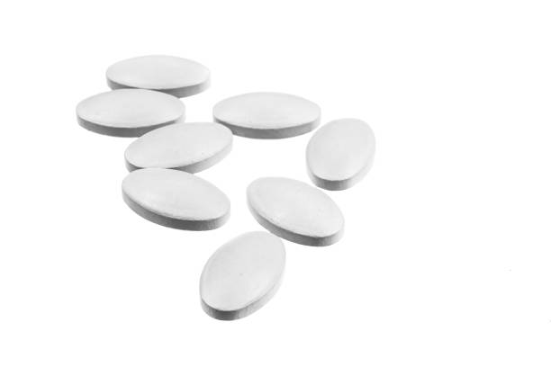 istock gray pills on a white isolated background 1301044004