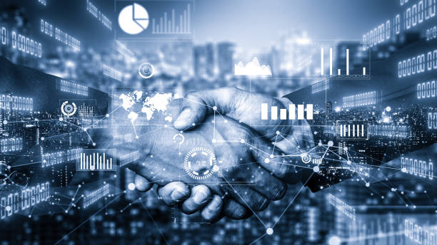 istock Imaginative visual business handshake with computer graphic of investment data 1301045475