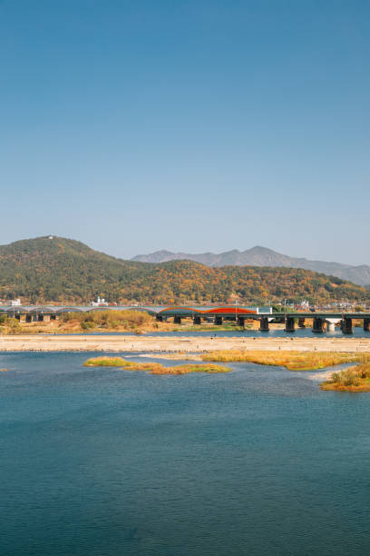 istock Miryang river and mountain at autumn in Miryang, Korea 1301049274