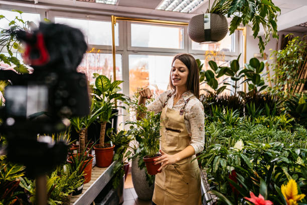 istock Female florist worker vlog recording 1301049489