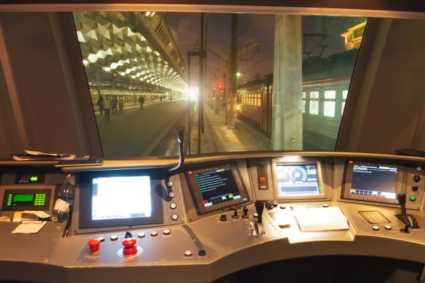 istock Train driver's cab at night at the station before departure. 1301050675
