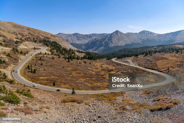 Autumn Mountain Road A Panoramic Overview Of A Winding Mountain Road At East Of The Summit Of Cottonwood Pass On A Sunny Autumn Afternoon Buena Vista Crested Butte Colorado Usa Stock Photo - Download Image Now