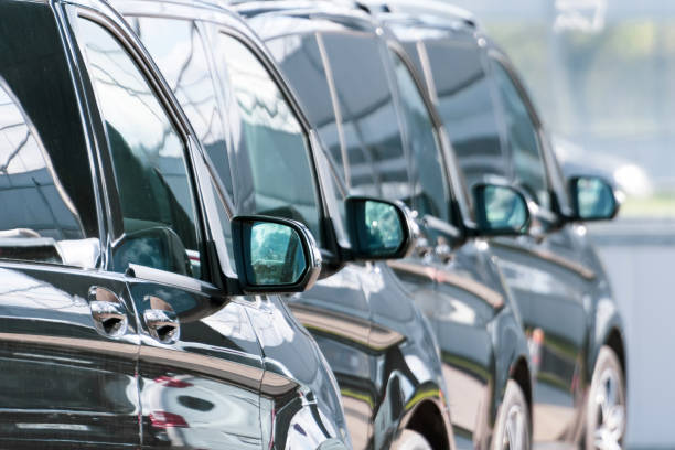 istock Side mirrors in a row of cars. 1301050972