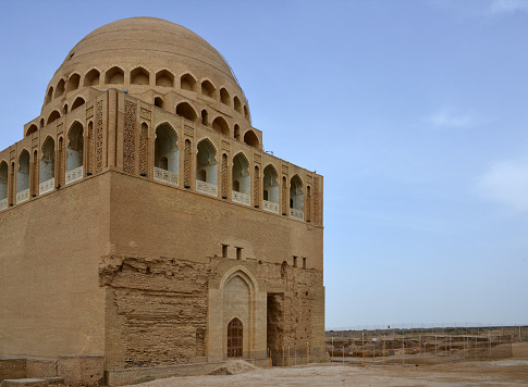 Merv, Mary Region, Turkmenistan: tomb of Soltan Sanjar / Ahmad Sanjar (1086-1157), Seljuk ruler of Khorasan and later Sultan of the Seljuq Empire - center of the ruined walled city of Sultan Kala, ruins of ancient Merv - UNESCO World Heritage Site.