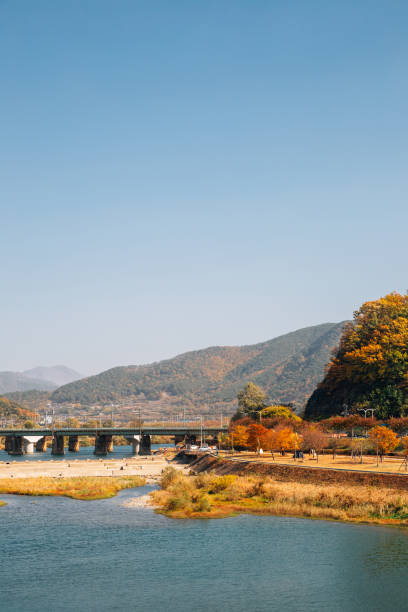 istock Miryang river and mountain at autumn in Miryang, Korea 1301052194