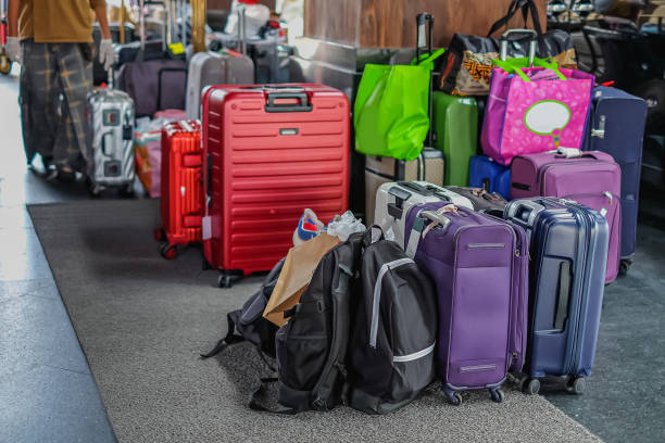 istock Luggage Bags Piled up at a Hotel Concierge. 1301052617