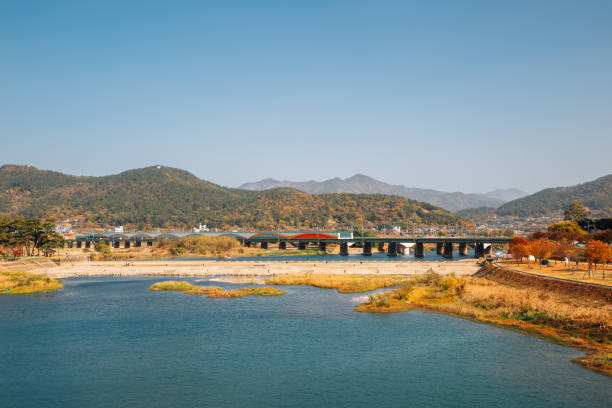 istock Miryang river and mountain at autumn in Miryang, Korea 1301053686