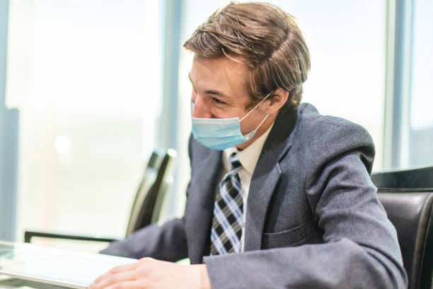 istock Millennial Male in Professional Office Setting Photo Series 1301053897