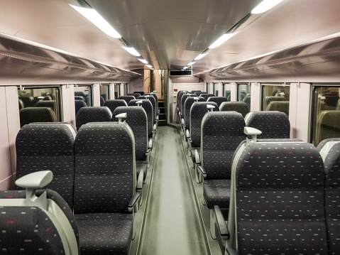 Stock photo showing the  interior view of an Indian long distance railway sleeper carriage travelling to Goa, India.