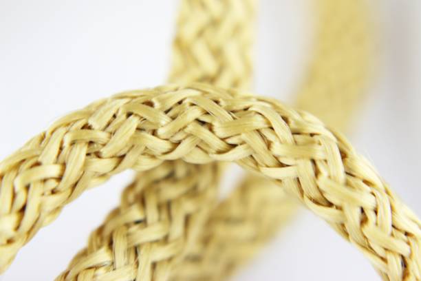 istock Rope of bright light brown color fabric ribbon 1301062155