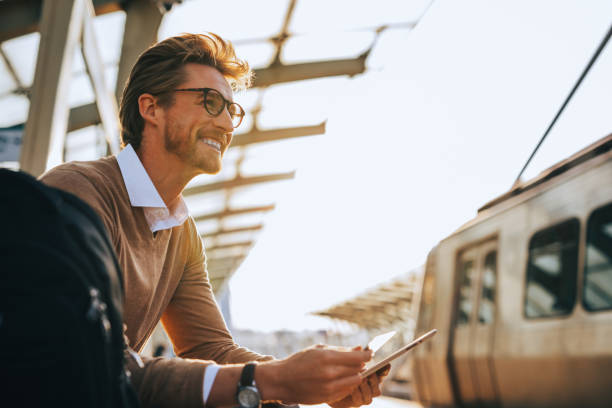 istock Man sitting at metro station and waiting for his train 1301063456