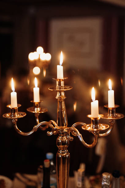 istock atmospheric candle decor with live fire on the banquet table 1301063615