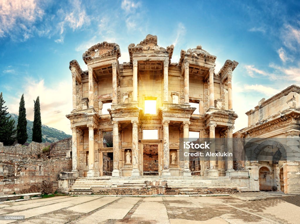 Facade of antique library of Celsus in Ephesus on sunny day Facade of the antique library of Celsus in Ephesus on a sunny day. Turkey. Panorama Ephesus Stock Photo