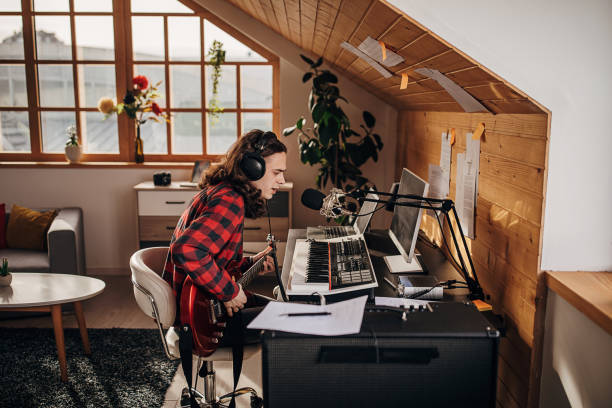 istock Male artist making music in recording studio 1301069282