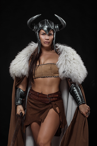 Beautiful brunette Sword wielding fantasy horned helmet viking warrior female