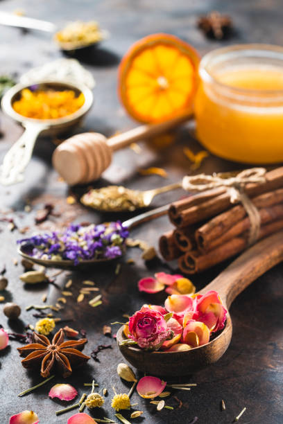istock Dried herbal tea with honey featuring rose petals tea and mallow 1301069560