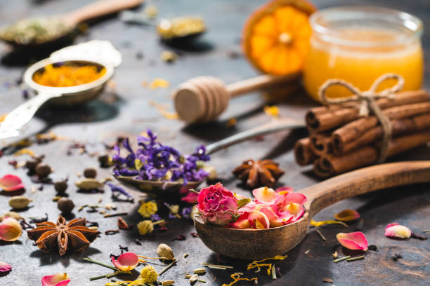 istock Dried herbal tea with honey featuring rose petals tea and mallow 1301069717