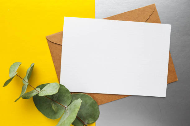 istock white envelope on a gray and yellow background. invitation 1301070806