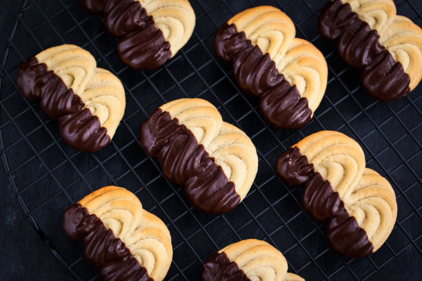 istock Homemade chocolate dipped shortbread cookies on dark background 1301071443