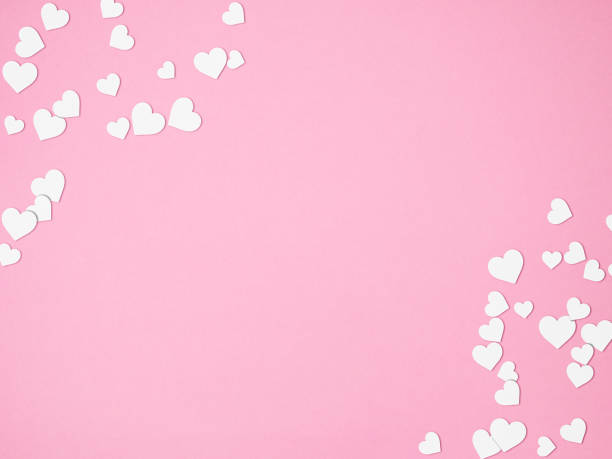 istock Love frame made of heart shape paper pattern on pink background with copy space, happy valentine's day, mother's day, flower background, flat lay, top view 1301073768