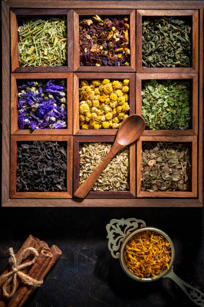istock Wooden box of Tea and herbs including black tea, mallow, chamomile, fennel 1301074607
