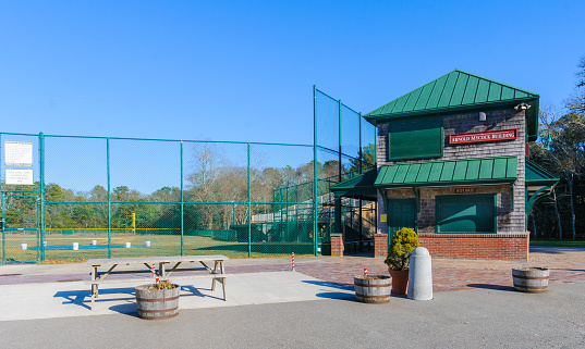 Cotuit, Massachusetts, USA - February 6, 2021- Although closed for the season, the baseball field, snack bar and press box at Lowell Park awaits the summer for the Cape Cod Baseball League''s 2021 playing season.  This park in the home of the Cotuit Kettleers which has sent many players off to careers in Major League Baseball.