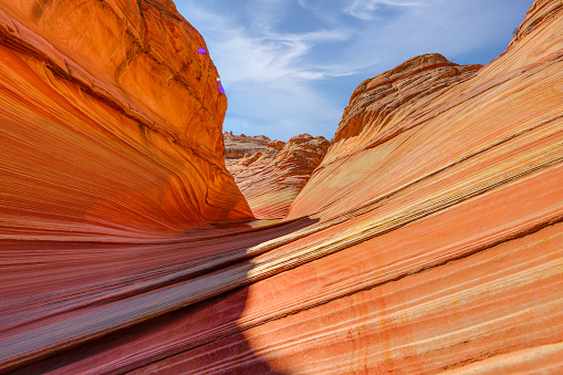 The Wave is a popular permit only hike in Arizona that features water like patterns in sandstone