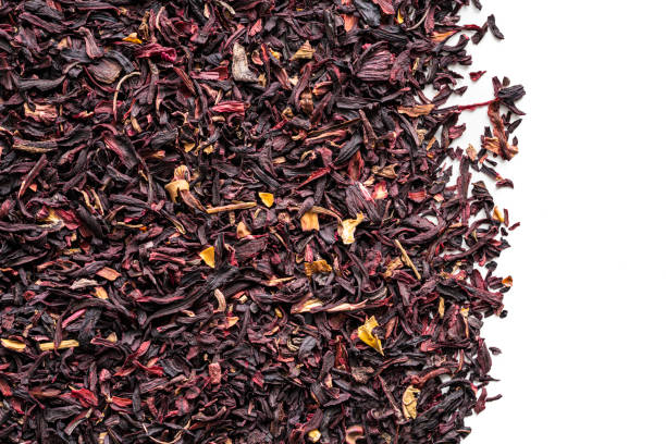 istock Hibiscus Roselle dried flower petals for tea isolated on white 1301081949
