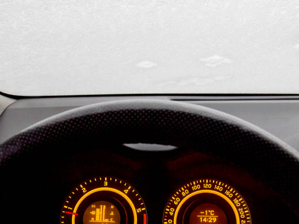 istock Cleaning car after snow storm 1301086297