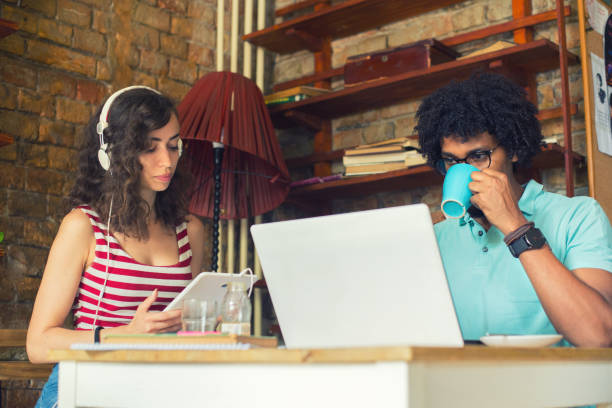 istock University students studying in the coffee shop 1301088433