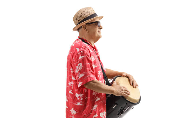 istock Casual mature man playing conga drums 1301090501