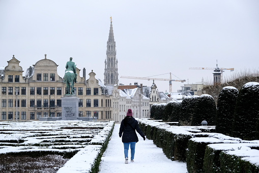 People walk in the snow-covered  central of Brussels, Belgium on February 8th, 2021.