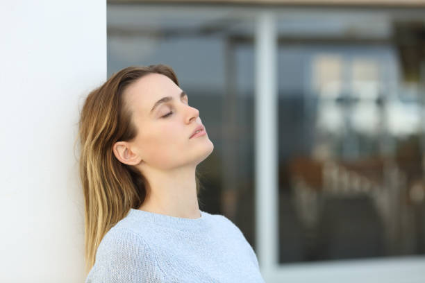 istock Serious woman resting in a terrace 1301093342