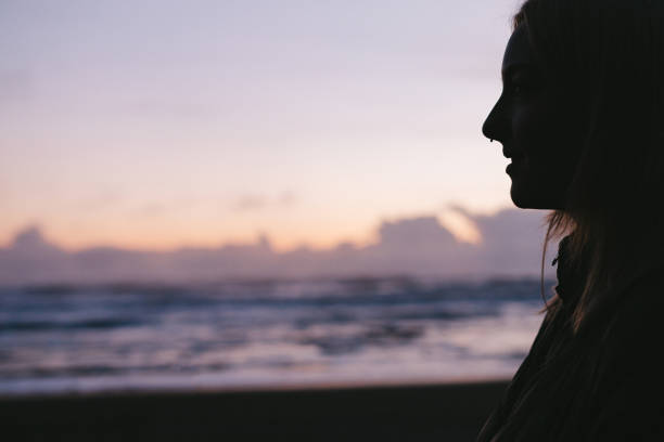 istock Young Woman Exploring Olympic Peninsula Coastline 1301094996